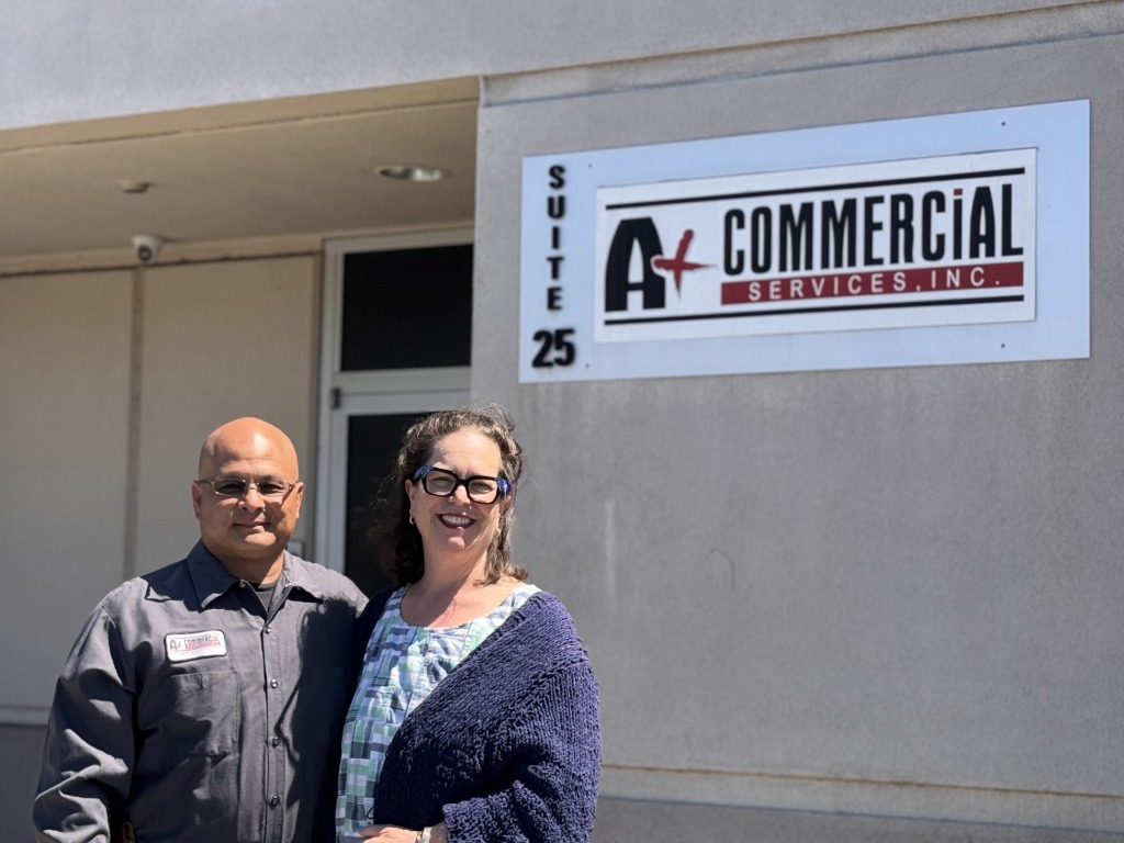 Herb and Julie in front of A+ Commercial Services headquarters